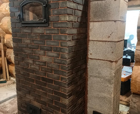 Tamsių klinkerio plytų periodinio kūrenimo pirties krosnis