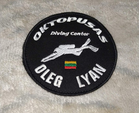 Vardinis antsiuvas Oktopuso Nardymo Centro užsakymas
