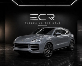 A 2025 Porsche Cayenne S Coupé in grey, with a 4.0-litre V8 (359 kW, about 490 hp) and all-wheel drive. The sloping roofline adds style, the handling stays pure Porsche, and there is room for five. ...