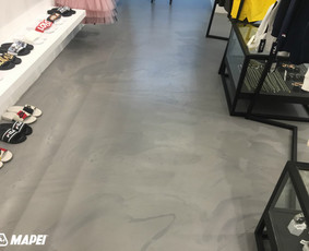 ULTRATOP dekoratyvinio betono grindų danga. Natūralus efektas. Prekybinės paskirties patalpos "SALT Concept" Vilniuje. 
http://velvemst.lt/uploads/517_ultratop_lt_160318.pdf