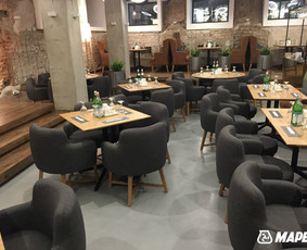 ULTRATOP dekoratyvinio betono grindų danga. Natūralus efektas. Restoranas "Gan Bei" Gedimino 9, Vilnius. 
http://velvemst.lt/uploads/Ultratop_LT.pdf