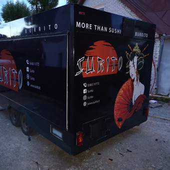 Reklama ant transporto Kaunas MB Spinozauras nuotrauka 1