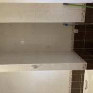 Plytelių nuėmimas ir išvežimas.