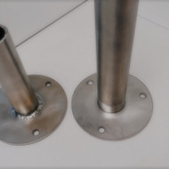 Pritvirtinti metalinį skersinį tarp dviejų sienų