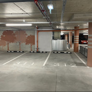 Automobilio krovimo stotelės instaliacija požeminio parkingo vietoje