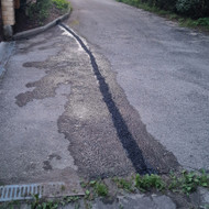 Asfaltavimo ant esamo asfalto suformuoti nubėgimą