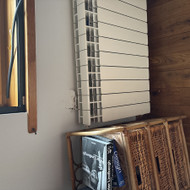 Radiatoriaus laikiklio ir sienos remonto paslauga