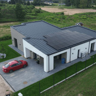 Sniego nukasimas nuo stogo