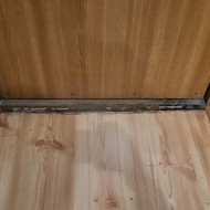 Laminato klojimas koridoriuje ir sujungimas su kambariais (Vilnius)