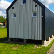 Reikalingas karkasinio namelio pervežimas