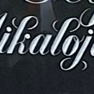 Raidžių ir portretų kalimas ant paminklo